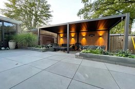 Je eigen luxe buitenruimte met een stijlvolle overkapping aan huis